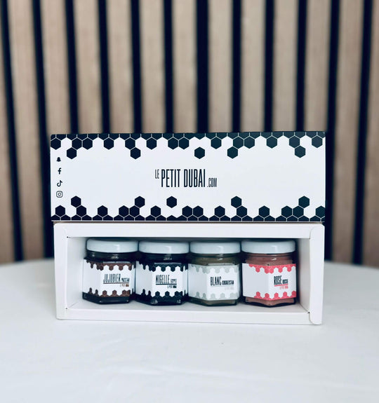 Pack decouverte miel composé de 4 pots de miel 50g avec boite ouverte